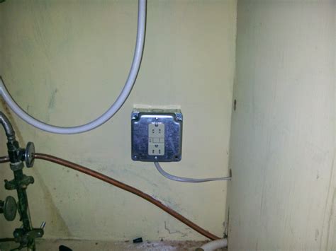 electrical junction box under sink|electrical outlet under sink.